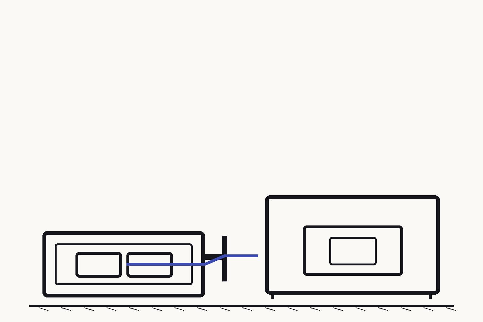 A magnetic specimen rests in a sealed side tray outside a nonmagnetic correction fixture whose empty cradle is clearly incompatible — The workflow abstains by keeping unsupported magnetic material outside the correction fixture